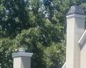 Columns were required to accommodate the fireplace in the added screened-in porch/den area
 